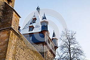 German fairytale castle in winter landscape. Castle Romrod in Hesse, Vogelsberg, Germany. Beautiful view on castle.