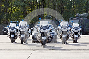 German feldjaeger, military police motorcycles and vehicles stands in formation