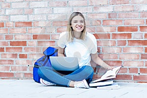 German female student learning at computer