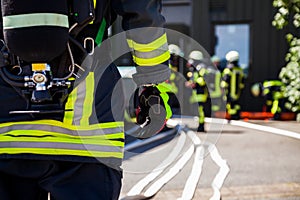 German fireman Feuerwehr stands near an accident