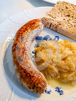 German Franconian bratwurst with sauerkraut and bread