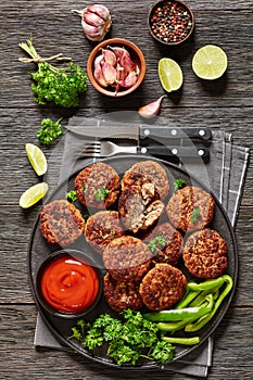 german frikadellen of ground meat on a plate photo