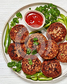 german frikadellen of ground meat on a plate photo