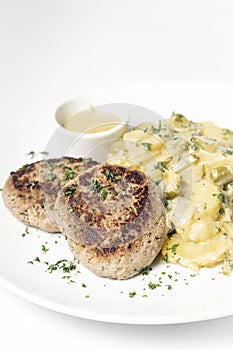 German frikadellen meatballs with creamy onion fried potatoes photo