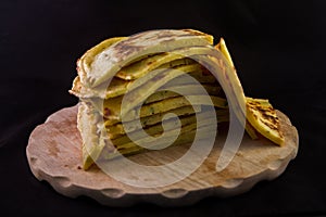 German frittatensuppe and omelette prepared and cut on a wooden cutting board photo