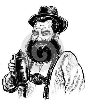 German man drinking a mug of beer