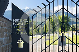 German military cemetery in autumn with mountains in the background and many graves of soldiers killed in the Second World War.