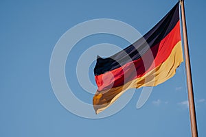 German national flag on blue sky background
