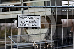 German notice Sign Parents are liable for their children in front of a - Privatgelaende - private property