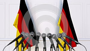 German official press conference. Flags of Germany and microphones. Conceptual 3D rendering