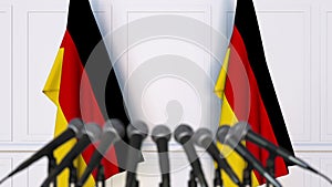German official press conference. Flags of Germany and microphones. Conceptual animation