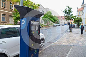 German parking ticket vending machine on a street