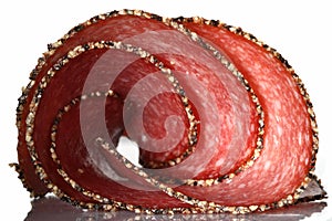 German pepper salami sausage sliced twisted