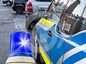 German police car with flashing lights