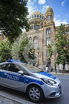 German police car in front of the old berlin synagogue germany