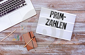 German Primzahlen prime numbers, office desk flat lay