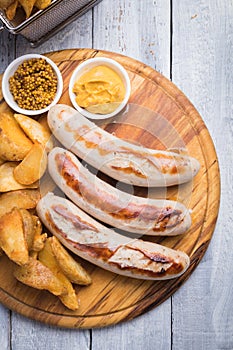 German sausages with mostard and fried potato