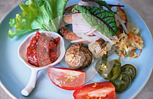 German sausages with stewed cabbage and baked potatoes