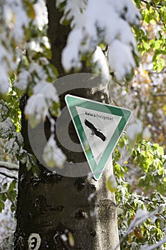 German sign `Naturschutzgebiet` means nature reserve or conservation area in English language photo