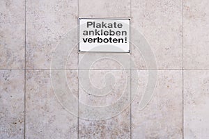 German sign Plakate ankleben verboten translates as post no bills