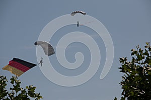 German skydiver in the air with German flag