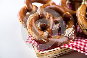 German soft Brezel pretzel with salt in bread basket