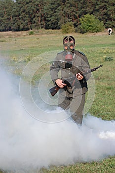 German soldier in gas mask . WW2 reenacting