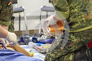 German soldiers practice a medical training