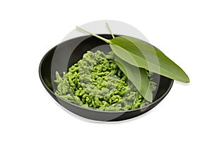 German Spaetzle made with Allium Ursinum or wild garlic in a bowl