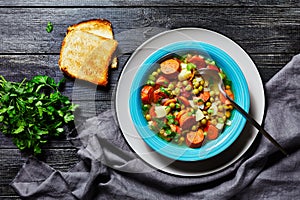German split pea soup with sausage on a plate
