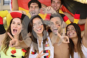 German sport soccer fans celebrating victory. photo