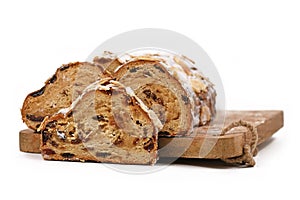 German Stollen cake, a fruit bread with nuts, spices, and dried or candied fruits with powdered sugar