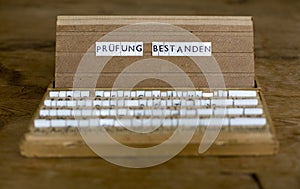 German text: Pruefung Bestanden