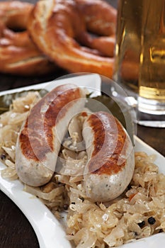 German white sausage with sauerkraut and preztel