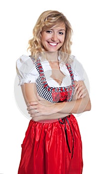German woman with crossed arms in a traditional bavarian dirndl