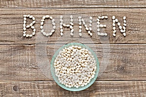 German word bohnen written with white beans