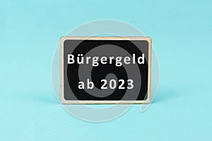 The german word for citizen money from 2023 is standing on a paper, new financial help system for unemployment in Germany