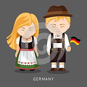 Germans in national dress with a flag.