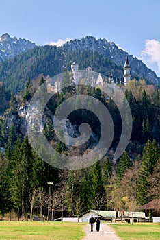 Germany Bavaria Romantic Road. Fussen. Tourists walking at Neuschwanstein castle