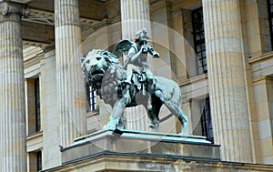 Germany, Berlin, Berlin Concert Hall (Konzerthaus Berlin), bronze lion and angel statue in front of the concert hall