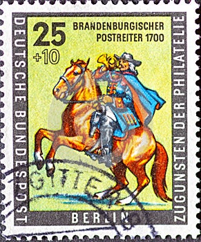 GERMANY, Berlin - CIRCA 1956: a postage stamp from Germany, Berlin showing Brandenburg Post rider around 1700th day of postal stam