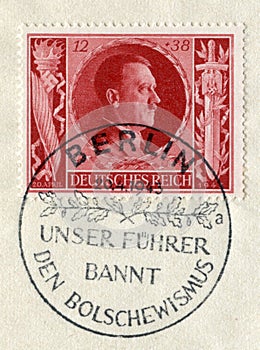 GERMANY - CIRCA 1943: German historical stamp:  `54th Birthday of Adolf Hitler` with special cancellation `Our Fuhrer bans bolshev