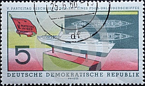 GERMANY, DDR - CIRCA 1960 : a postage stamp from Germany, GDR showing a model and sketch of the FDGB holiday ship MS `Fritz Hecke