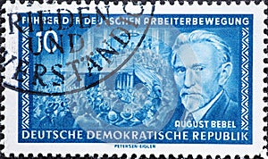 GERMANY, DDR - CIRCA 1955  : a postage stamp from Germany, GDR showing a portrait of the SPD leader August Bebel, Versammlung Text