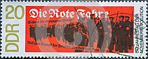 GERMANY, DDR - CIRCA 1968: a postage stamp from Germany, GDR showing 50th anniversary of the November Revolution: revolutionaries