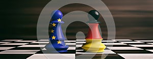 Germany and European Union flags on chess pawns on a chessboard. 3d illustration