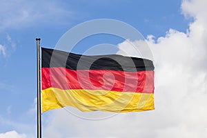 Germany flag on the blue sky background