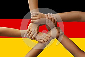Germany flag, intergration of a multicultural group of young people