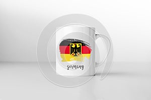 Germany flag on white coffee mug.