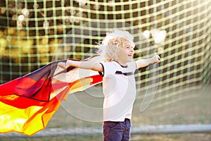 Germany football fan kids. Children play soccer
